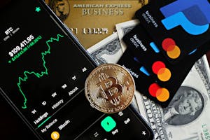 A dynamic image showcasing Bitcoin, credit cards, and financial apps for investment enthusiasts.