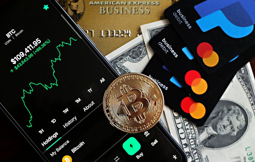 A dynamic image showcasing Bitcoin, credit cards, and financial apps for investment enthusiasts.