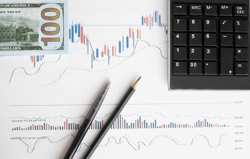Stock analysis workspace featuring charts, a calculator, and currency for data-driven insights.