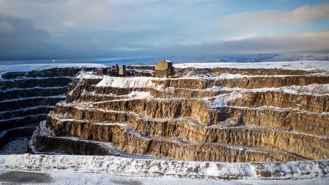 Aerial view of a snow-covered quarry in Bewerley, North Yorkshire, England during winter.