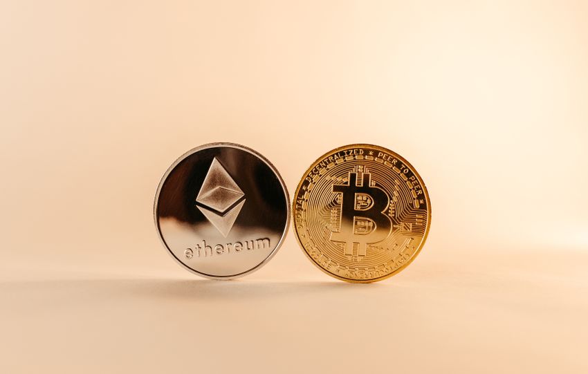 Close-up of Bitcoin and Ethereum coins symbolizing digital currency and blockchain technology.