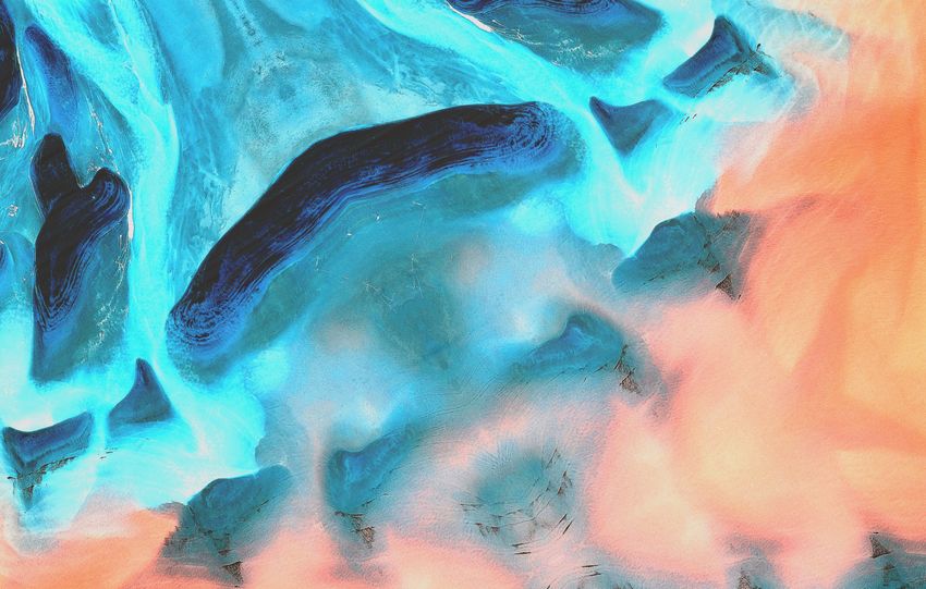 Stunning abstract art featuring dynamic blue and coral colors with fluid patterns.