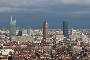 Aerial view of Lyon's skyline featuring modern skyscrapers and urban architecture.