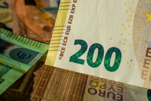 Detailed close-up of a 200 Euro banknote highlighting currency design and details.
