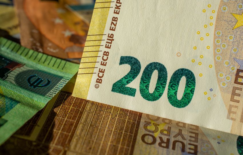 Detailed close-up of a 200 Euro banknote highlighting currency design and details.