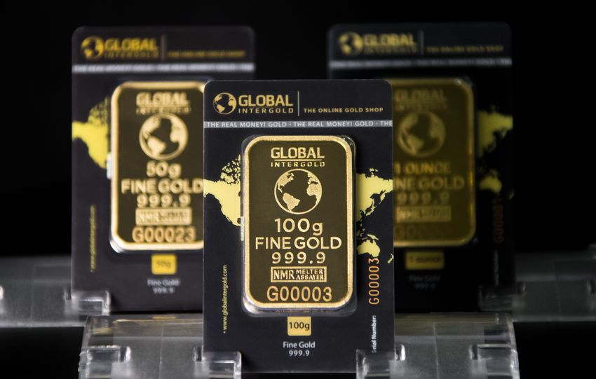 Focused image of 100g Intergold bars showcasing fine gold quality and luxury.